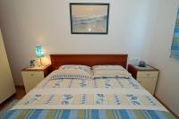 Posteľ alebo postele v izbe v ubytovaní Žigulin Apartment