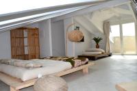 Łóżko lub łóżka w pokoju w obiekcie zen AR holiday-home