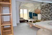 Łóżko lub łóżka w pokoju w obiekcie zen AR holiday-home