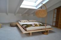 Łóżko lub łóżka w pokoju w obiekcie zen AR holiday-home