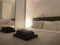 Postel nebo postele na pokoji v ubytování Luxury Lavender