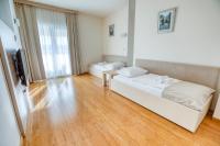Posteľ alebo postele v izbe v ubytovaní Hotel Villa MiraMar