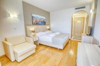 Posteľ alebo postele v izbe v ubytovaní Hotel Villa MiraMar