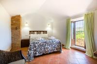 Postel nebo postele na pokoji v ubytování Casas rurales "Las Mellizas" Piscina privada - Caminito del Rey