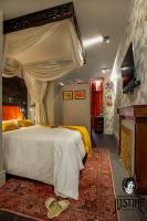Postel nebo postele na pokoji v ubytování Suite Opium Den by Justine Apartments Apartamento turístico en Madrid Río