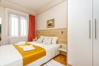 Posteľ alebo postele v izbe v ubytovaní Apartments Franelić