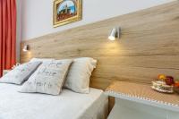 Posteľ alebo postele v izbe v ubytovaní Apartments Franelić