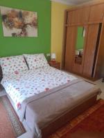 Posteľ alebo postele v izbe v ubytovaní Szalai Apartman