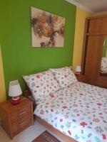Posteľ alebo postele v izbe v ubytovaní Szalai Apartman
