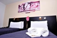 Posteľ alebo postele v izbe v ubytovaní 6 Bis HOTEL