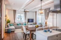 Televízia a/alebo spoločenská miestnosť v ubytovaní BalaLake Resort