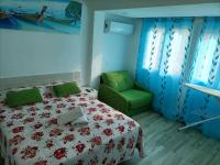 A bed or beds in a room at Apartamento con 2 dormitorios