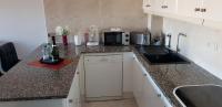 Kuchyň nebo kuchyňský kout v ubytování BELLA CASA - Helle Wohnung in Strandnähe