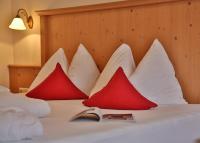 Łóżko lub łóżka w pokoju w obiekcie Noldis Hotel