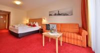 Łóżko lub łóżka w pokoju w obiekcie Noldis Hotel