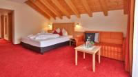 Łóżko lub łóżka w pokoju w obiekcie Noldis Hotel