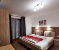 Posteľ alebo postele v izbe v ubytovaní Jogglerhof