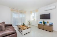 Telewizja i/lub zestaw kina domowego w obiekcie Apartment LAGANINI III