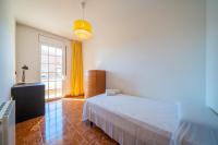 Postel nebo postele na pokoji v ubytování HomeHolidaysRentals Charme - Costa Barcelona