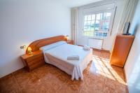 Postel nebo postele na pokoji v ubytování HomeHolidaysRentals Charme - Costa Barcelona