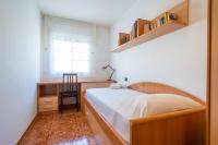 Postel nebo postele na pokoji v ubytování HomeHolidaysRentals Charme - Costa Barcelona