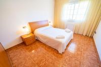Postel nebo postele na pokoji v ubytování HomeHolidaysRentals Charme - Costa Barcelona