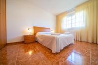 Postel nebo postele na pokoji v ubytování HomeHolidaysRentals Charme - Costa Barcelona