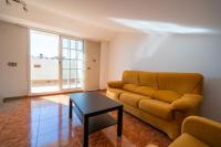 Posezení v ubytování HomeHolidaysRentals Charme - Costa Barcelona