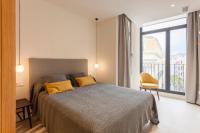 Postel nebo postele na pokoji v ubytování Apartamentos Málaga Premium - Calle Granada