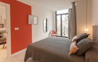 Postel nebo postele na pokoji v ubytování Apartamentos Málaga Premium - Calle Granada