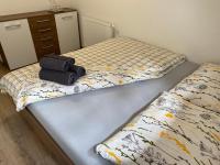 Postel nebo postele na pokoji v ubytování Penzion U Adama