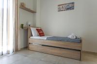 Posteľ alebo postele v izbe v ubytovaní Orama Apartments - Vacations Next to the Sea