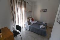 Posteľ alebo postele v izbe v ubytovaní Orama Apartments - Vacations Next to the Sea