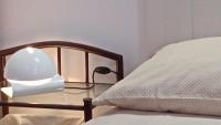 Postel nebo postele na pokoji v ubytování Apartments Janjac