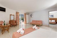 Posteľ alebo postele v izbe v ubytovaní Agrabella Hotel