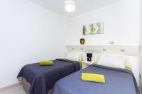 Postel nebo postele na pokoji v ubytování Home2Book Cozy Apartment Costa del Silencio, Pool