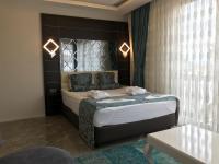 Postel nebo postele na pokoji v ubytování Venus Hotel