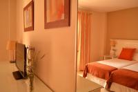 Postel nebo postele na pokoji v ubytování Hotel Pradillo Conil