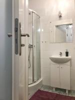 Kúpeľňa v ubytovaní Pastelove mieszkanie przy centrum - bezkontaktowo