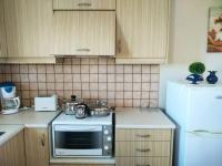 Kuchyň nebo kuchyňský kout v ubytování Riza Falasarna Apartments
