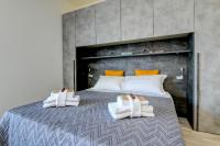 Posteľ alebo postele v izbe v ubytovaní Studio Baldo - Brenzone Holiday Apartments