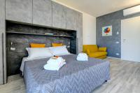 Posteľ alebo postele v izbe v ubytovaní Studio Baldo - Brenzone Holiday Apartments
