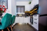 A kitchen or kitchenette at Avocado villa offering peace and relaxation