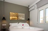 A bed or beds in a room at Avocado villa offering peace and relaxation