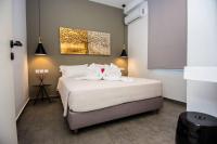 A bed or beds in a room at Avocado villa offering peace and relaxation