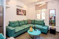 A seating area at Avocado villa offering peace and relaxation