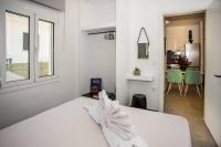 A bed or beds in a room at Avocado villa offering peace and relaxation