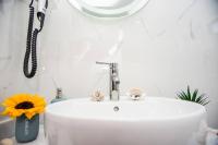 A bathroom at Avocado villa offering peace and relaxation