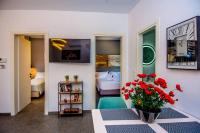 A television and/or entertainment centre at Avocado villa offering peace and relaxation