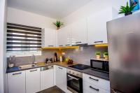 A kitchen or kitchenette at Avocado villa offering peace and relaxation